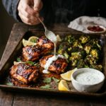 Sheet pan harissa chicken with roasted broccoli and a yogurt drizzle